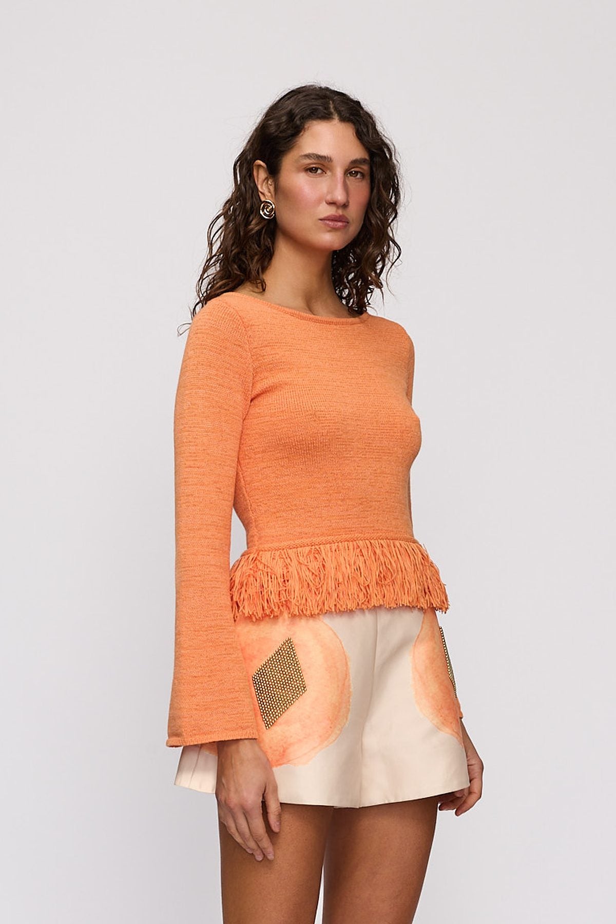 Tully Long Sleeve in Tangerine by The Wolf Gang – close-up view