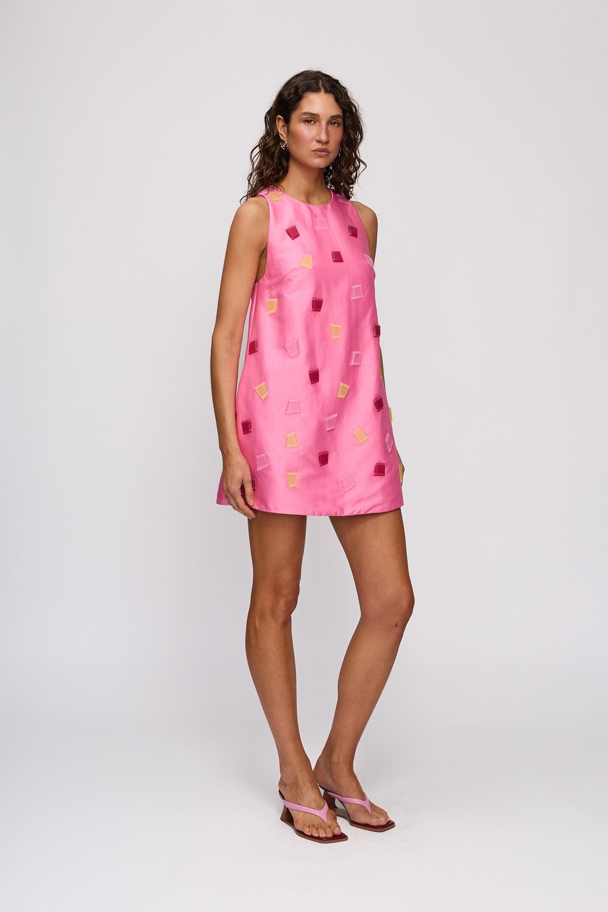 Velma Mini Dress in Candy by The Wolf Gang – front view, relaxed pose