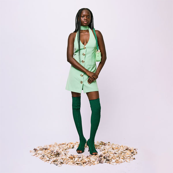 Atim wears the Irida Vest Dress in S