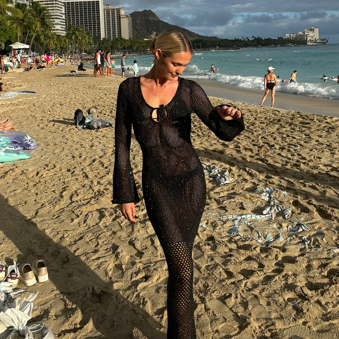 Laura wears the Coi Sequin Dress in XS