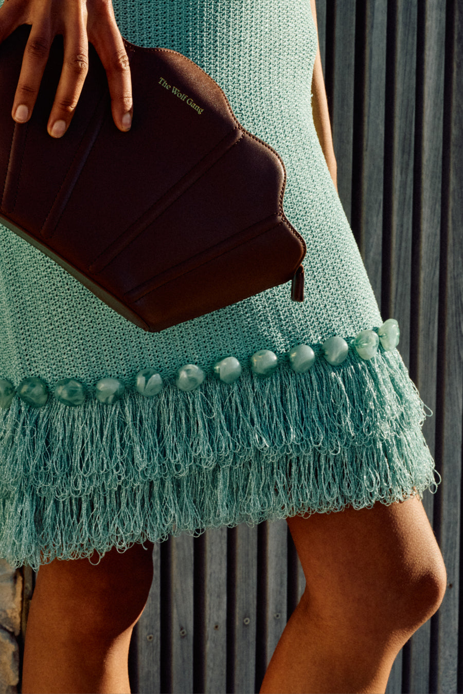 The Wolf Gang Casilda Sleeveless Mini Dress in Seafoam and Suri Shell Bag in Chocolate