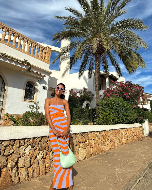 Charlotte wears the Aude Maxi Dress in S