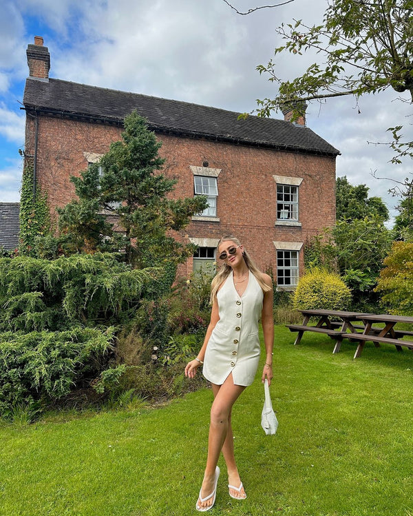 Sophia wears the Irida Vest Dress in S