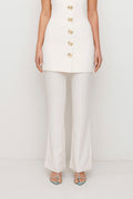 Women’s highwaisted Ivory White Irida Bootcut Pants perfect for brides with pin tuck detail and embroidered waistband—wear solo or as a matching set with Irida Vest Dress.