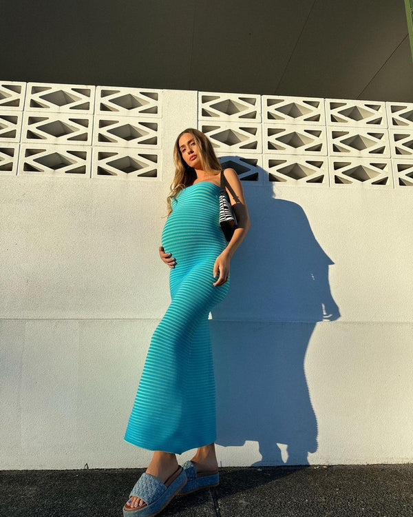 Shannon wears the Sunmor Knit Dress in M