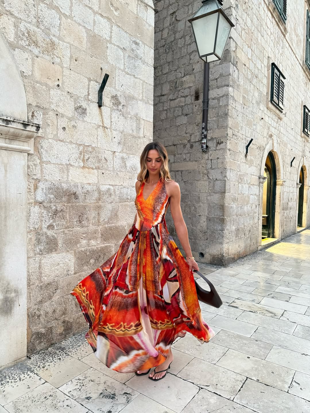 Georgia wears the Rumi Dress in XS