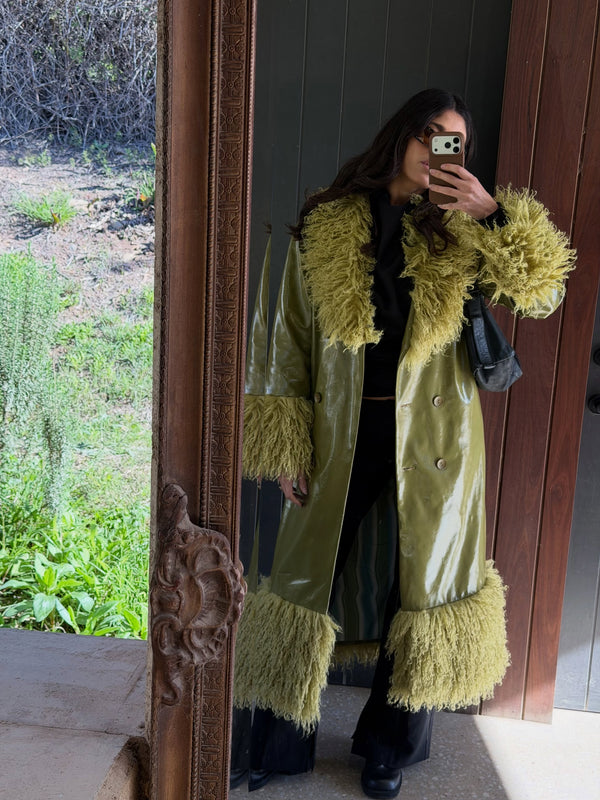 Summer wears the Abrigo Coat in size S