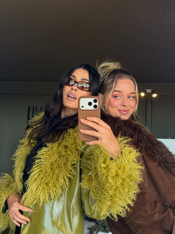 Summer wears the Abrigo Coat in size S