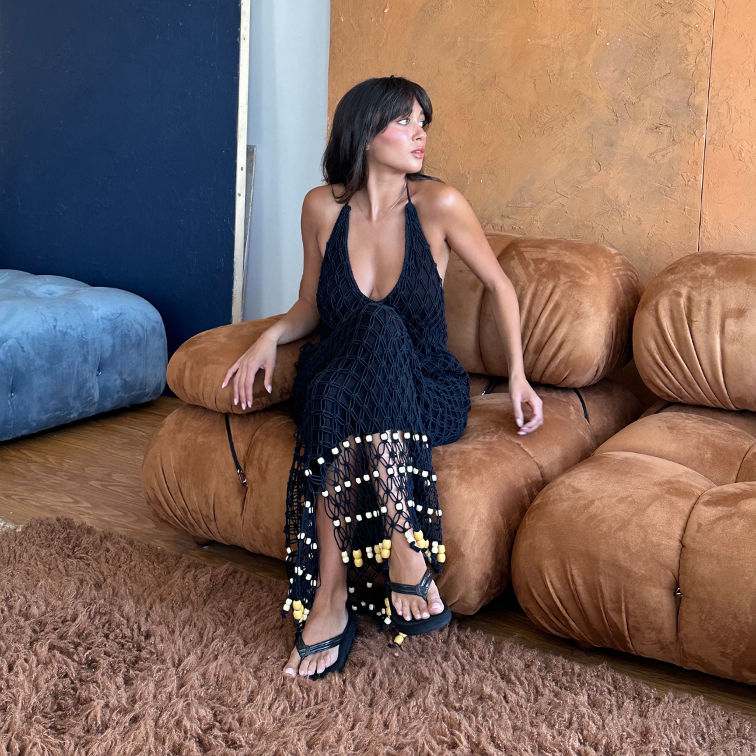 Sophia wears Reis Macrame Maxi Dress in S 