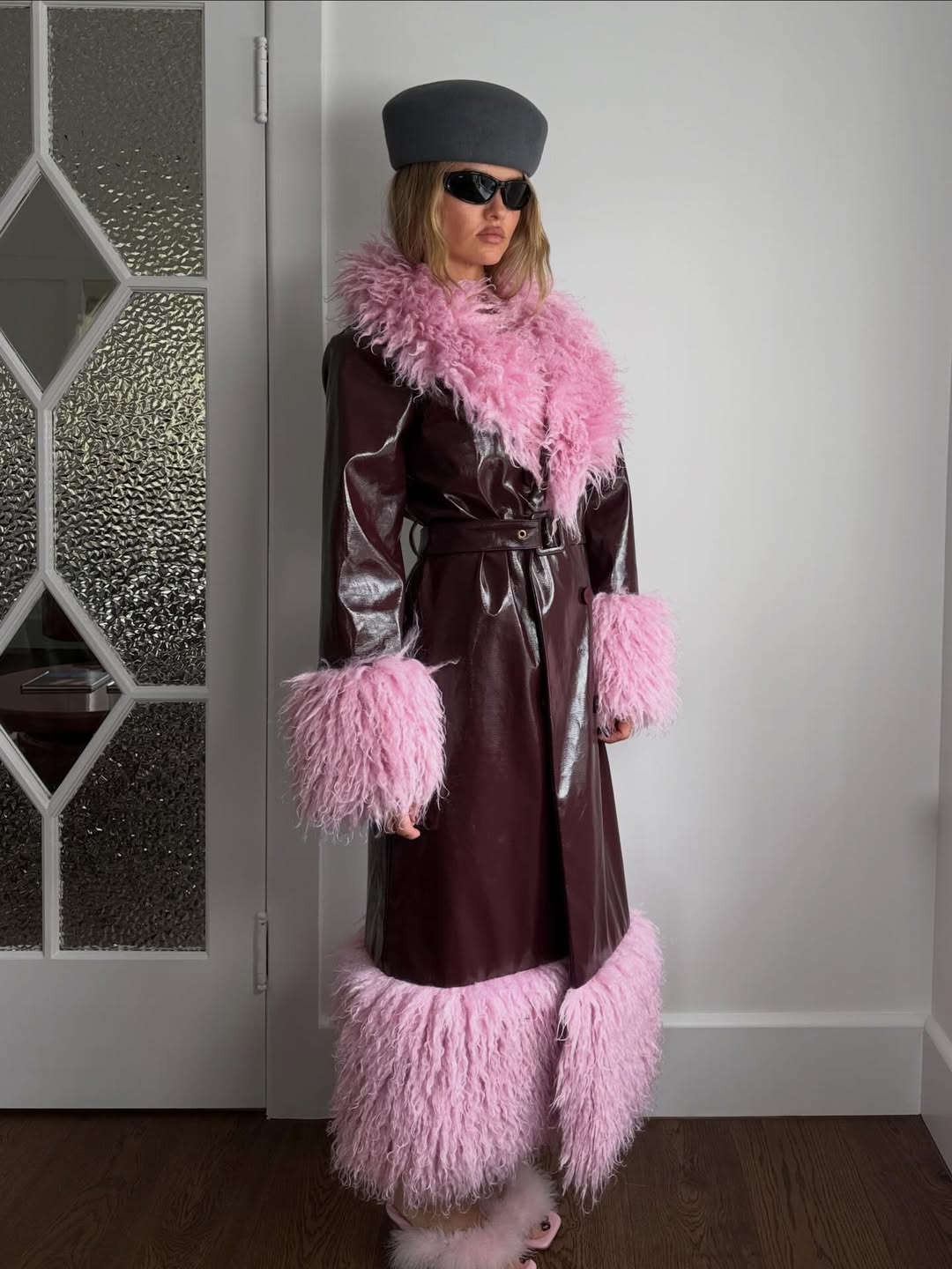 Paris wears the Abrigo Coat in S