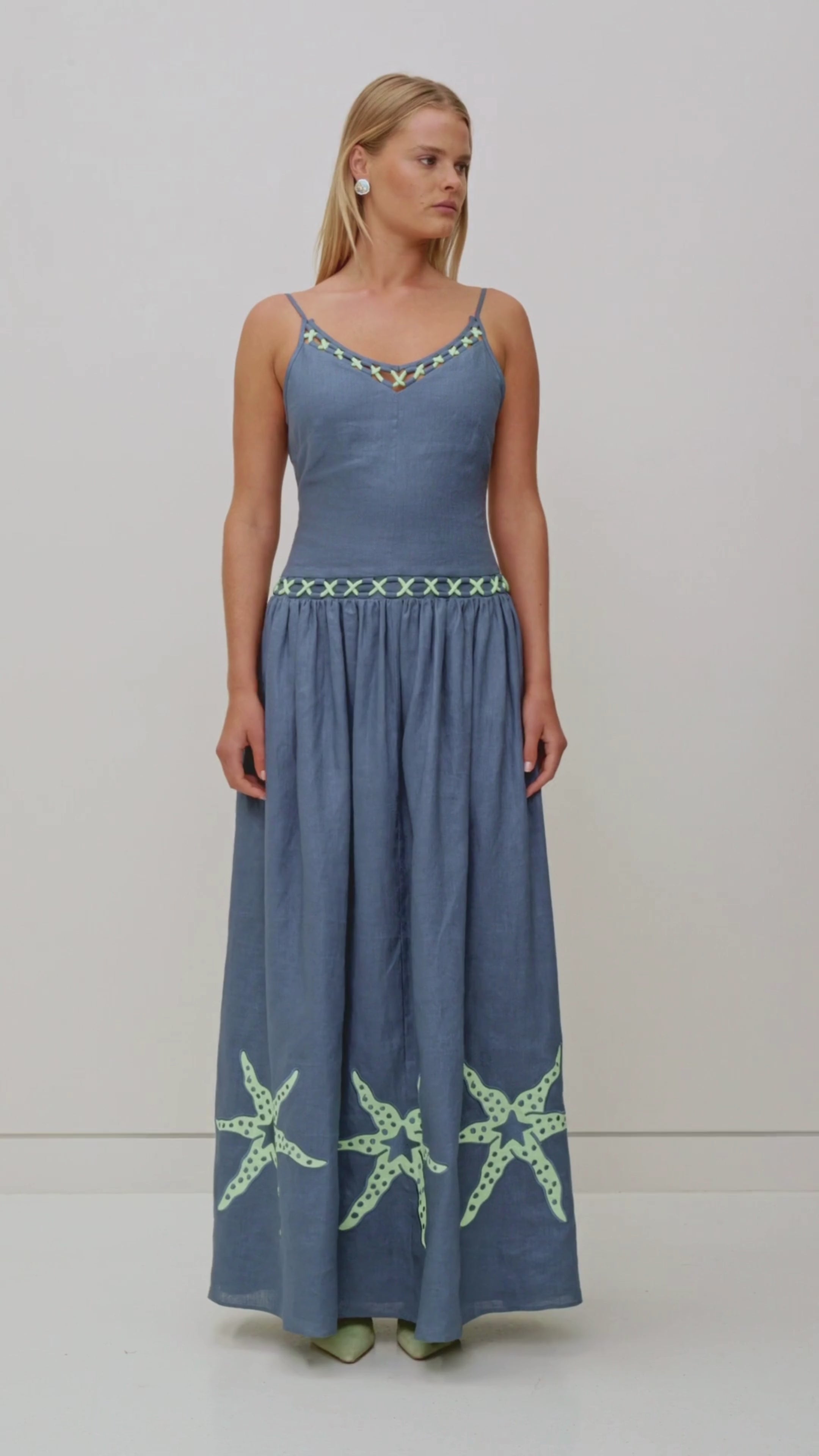 Women's stone blue cotton maxi dress with roped neckline by The Wolf Gang, elegant and versatile for day or evening wear.