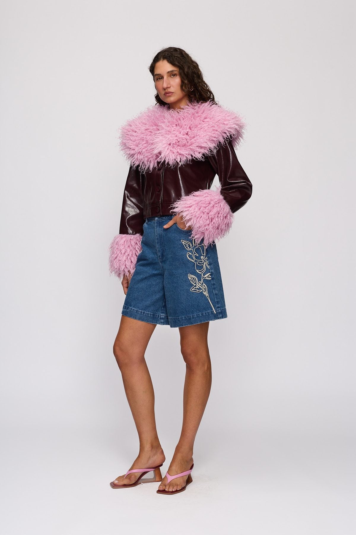 Abrigo Jacket in Berry by The Wolf Gang – three-quarter side view