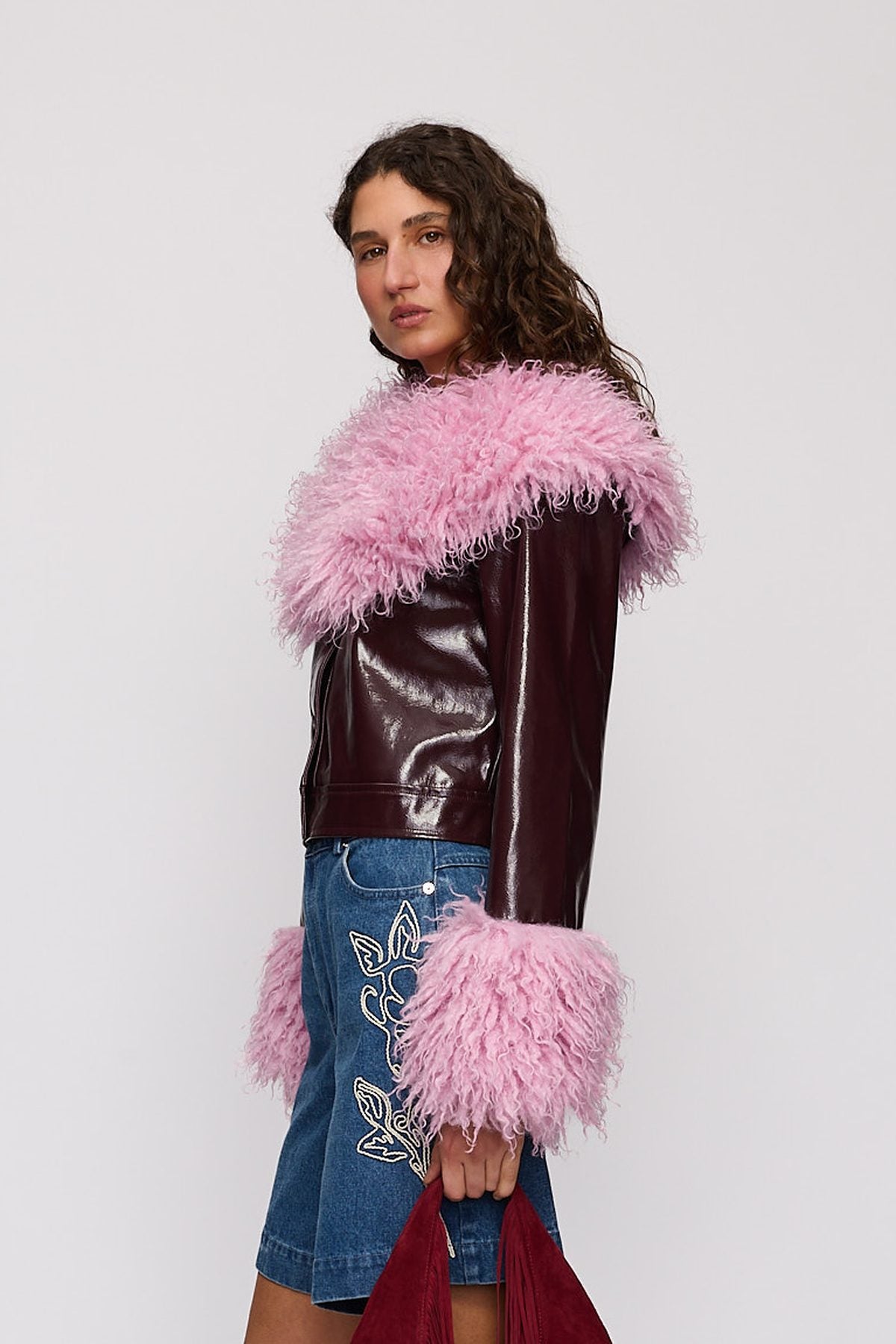 Abrigo Jacket in Berry by The Wolf Gang – close-up view