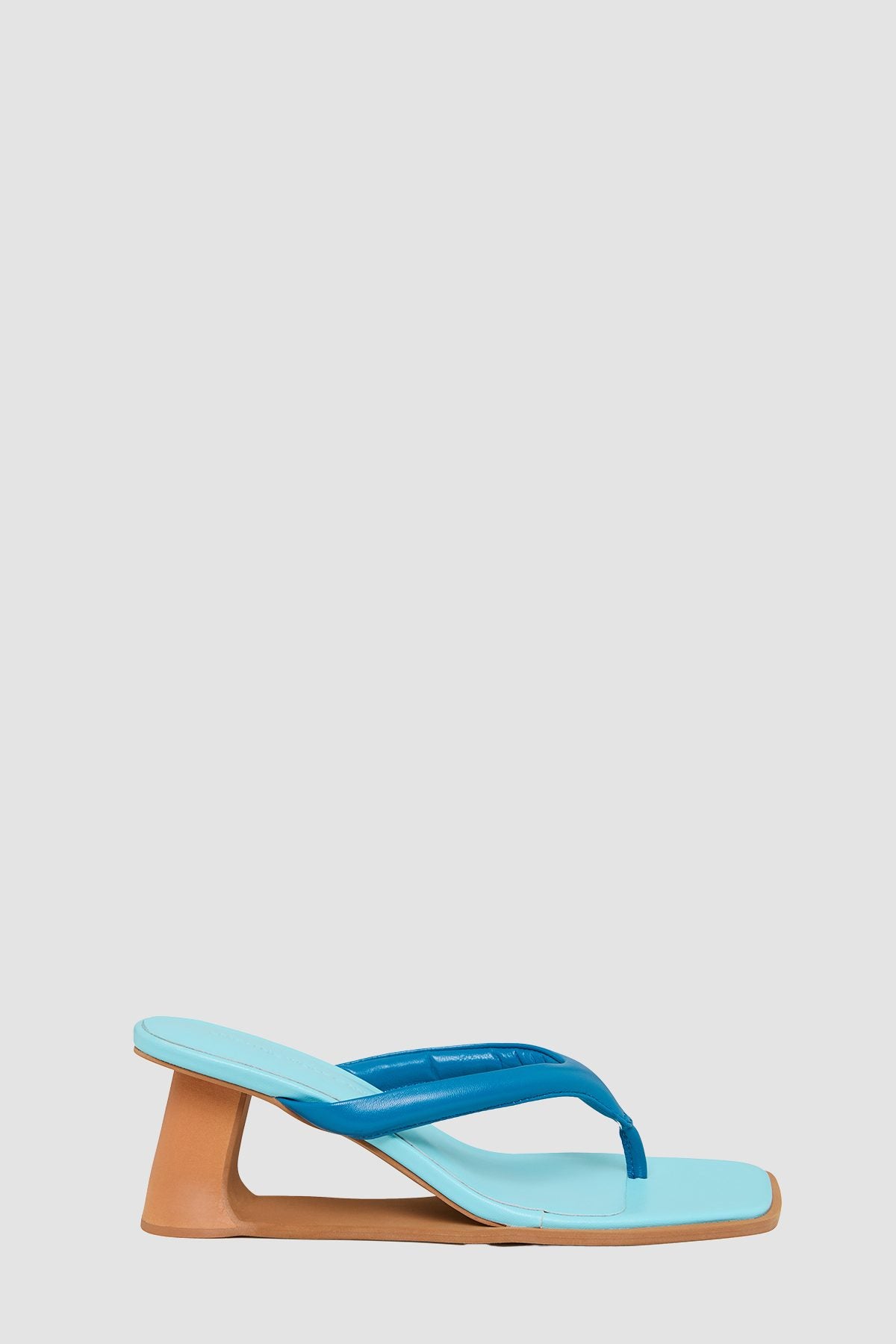 Allegra Heel in Blue by The Wolf Gang – side profile showing the sculptural wooden wedge