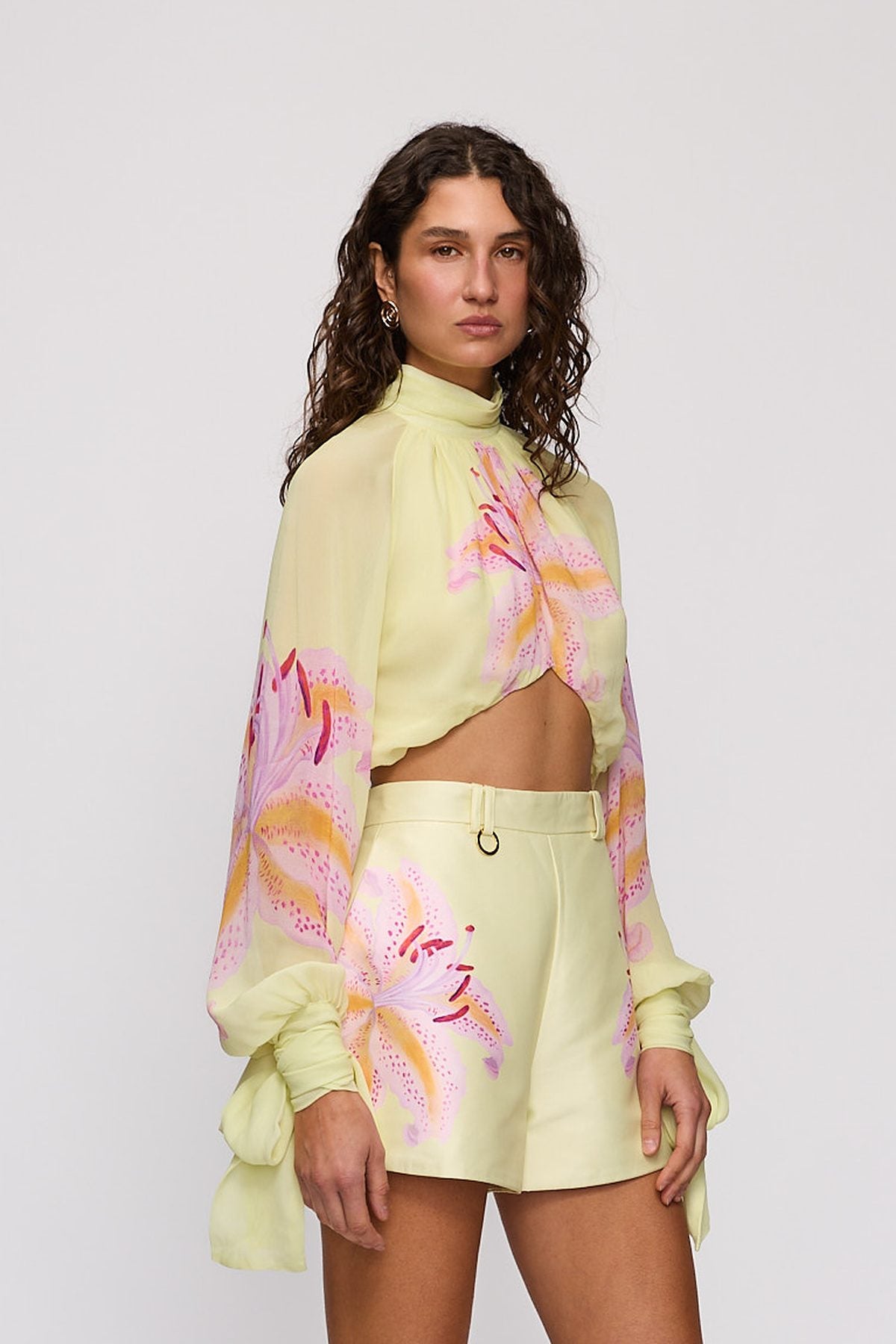 Celia Blouse in Candy Hibiscus by The Wolf Gang – close-up view