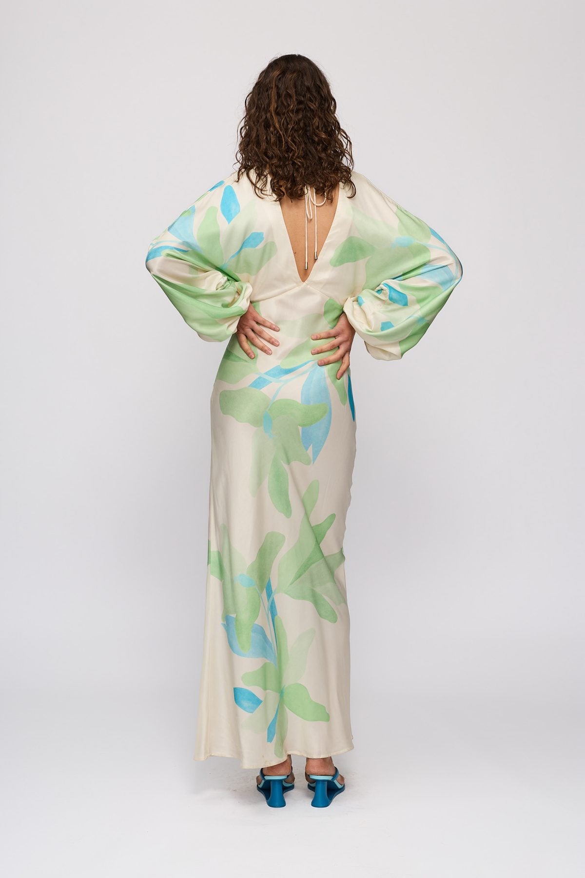 Concha Maxi Dress in Ocean Lily by The Wolf Gang – back view, hands on hips