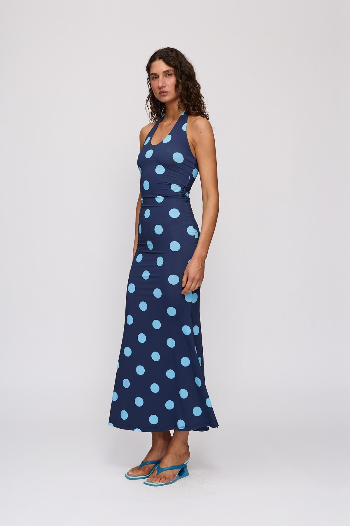 Giro Halter Dress in Storm Spot by The Wolf Gang – three-quarter side view