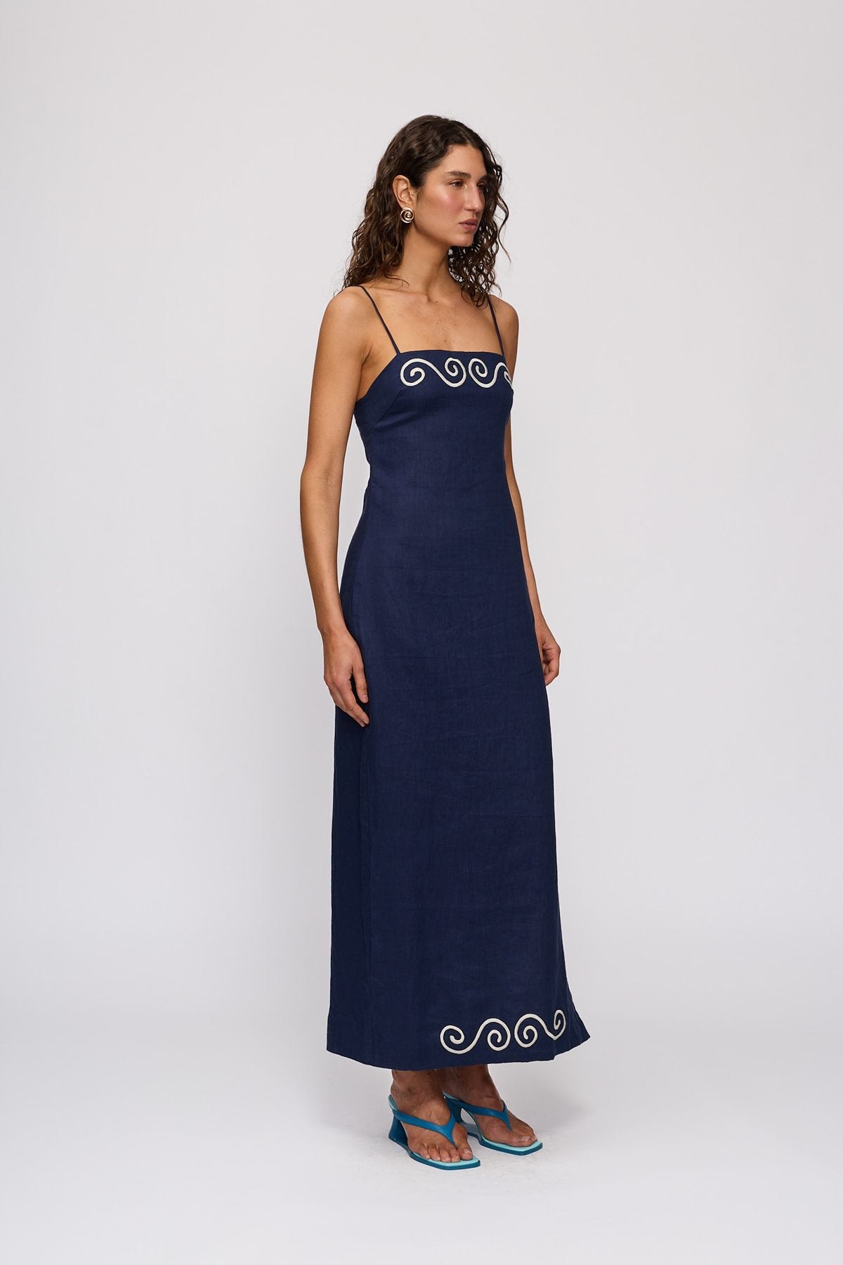 Seren Midi Dress in Navy by The Wolf Gang – full-length view