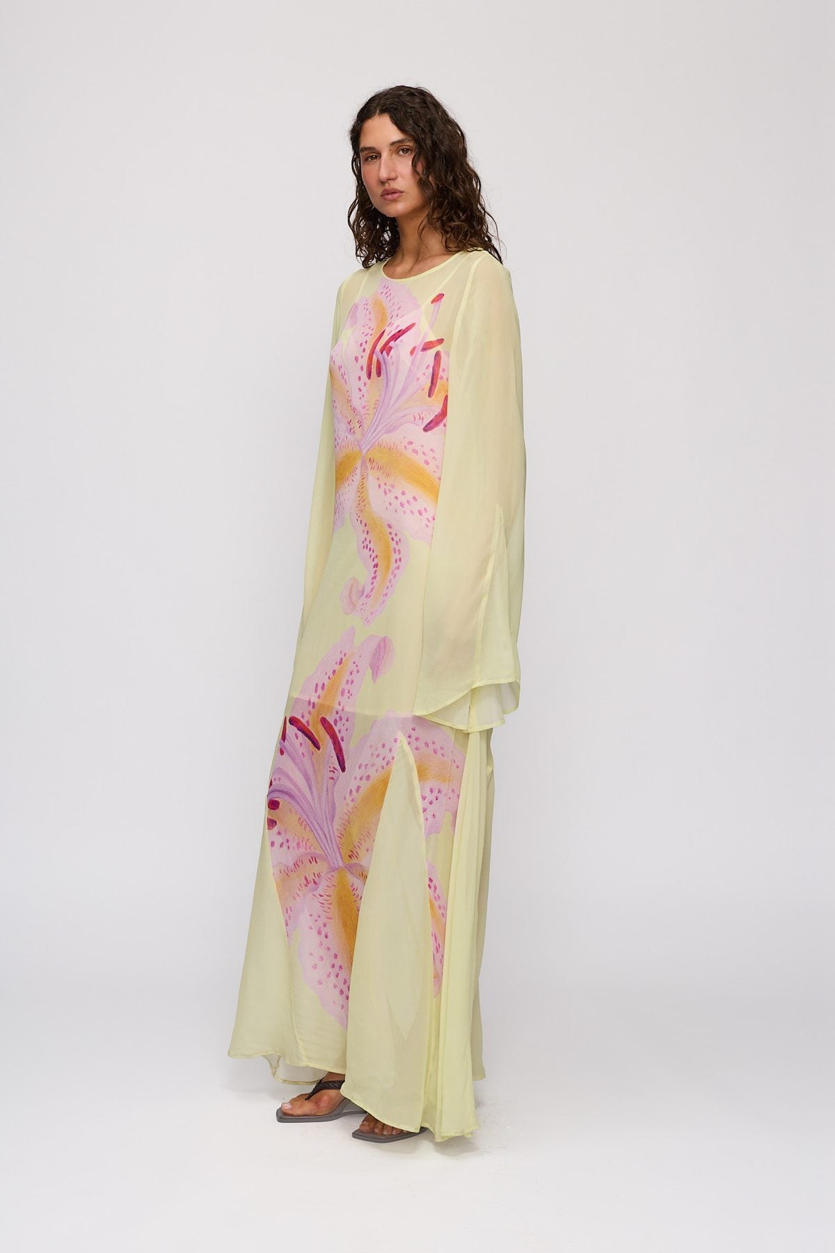 Solsana Maxi Dress in Candy Hibiscus by The Wolf Gang – three-quarter side view