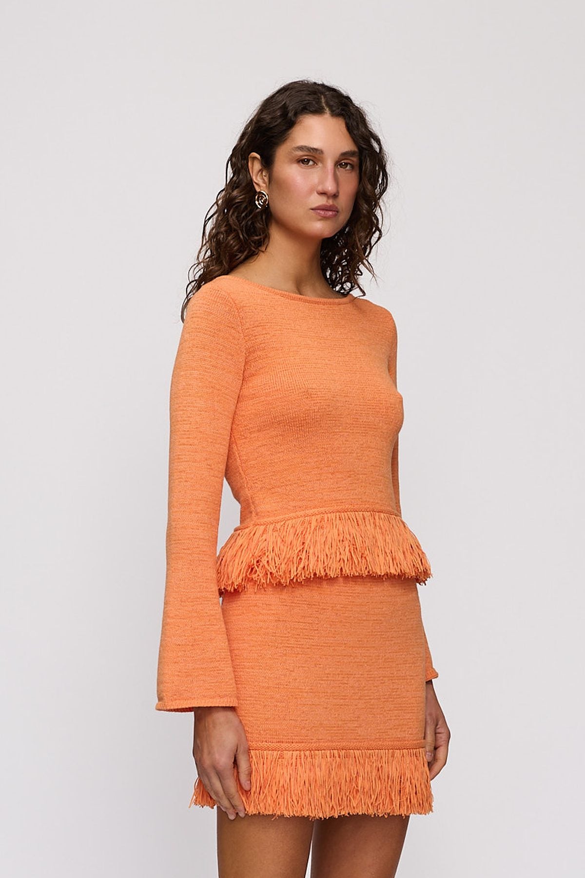 Tully Long Sleeve in Tangerine by The Wolf Gang – close-up view
