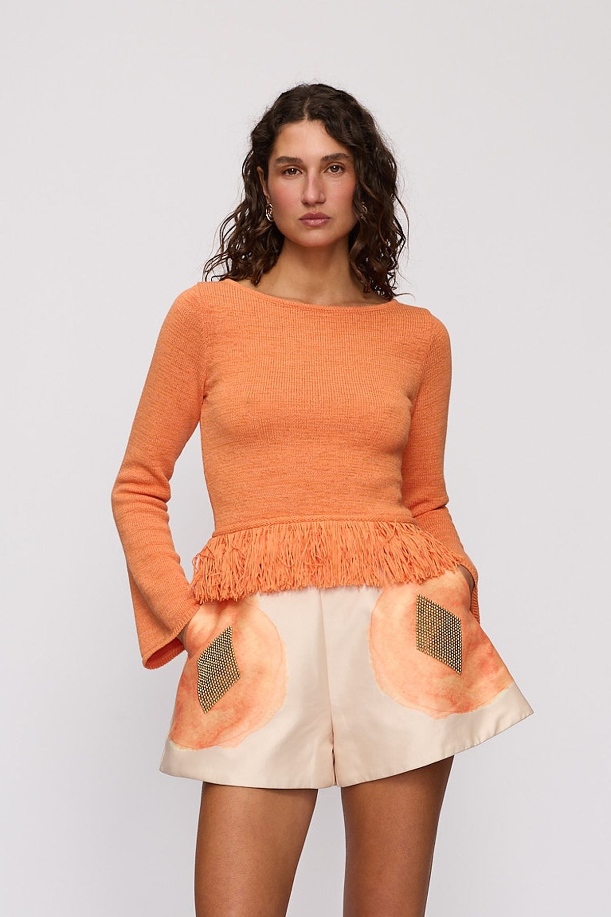 Tully Long Sleeve in Tangerine by The Wolf Gang – close-up view